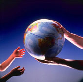 adults hand children the world